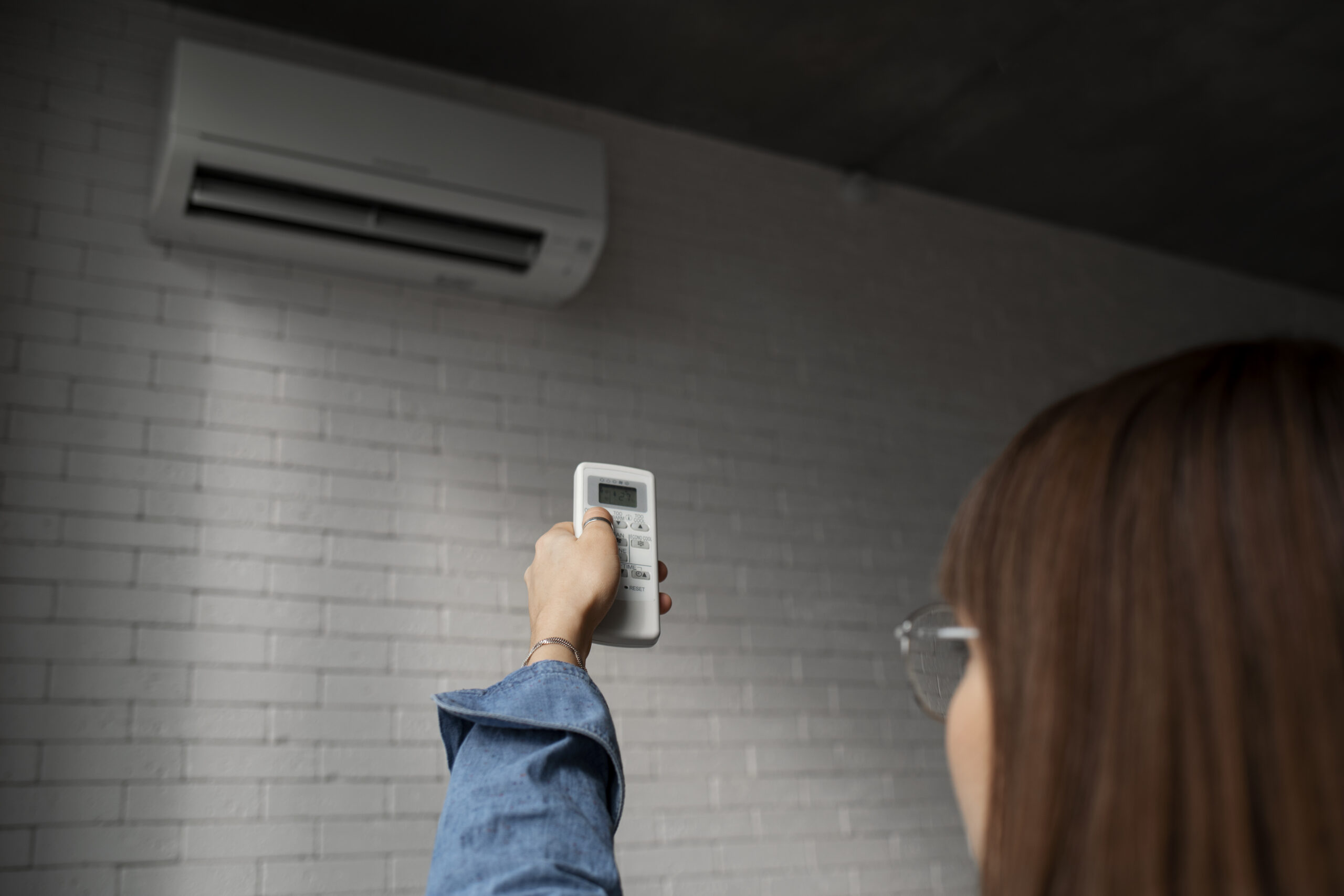 young woman using home technology scaled